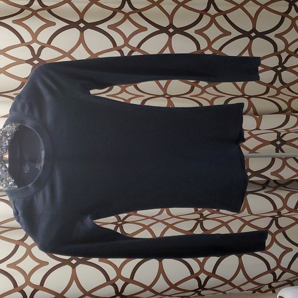 Miley Cyrun Dark grey, long studded sleeve top.